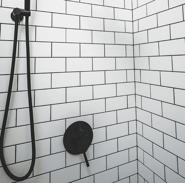 white tiles with black grout