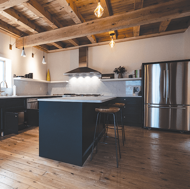 Black Kitchen Island in Renovated Kitchen