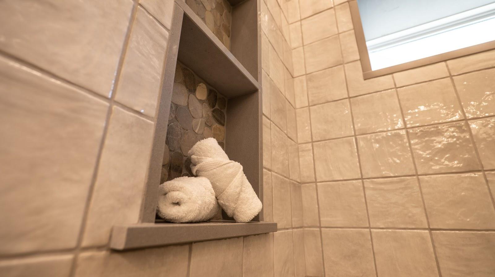 bathroom shelving with towels