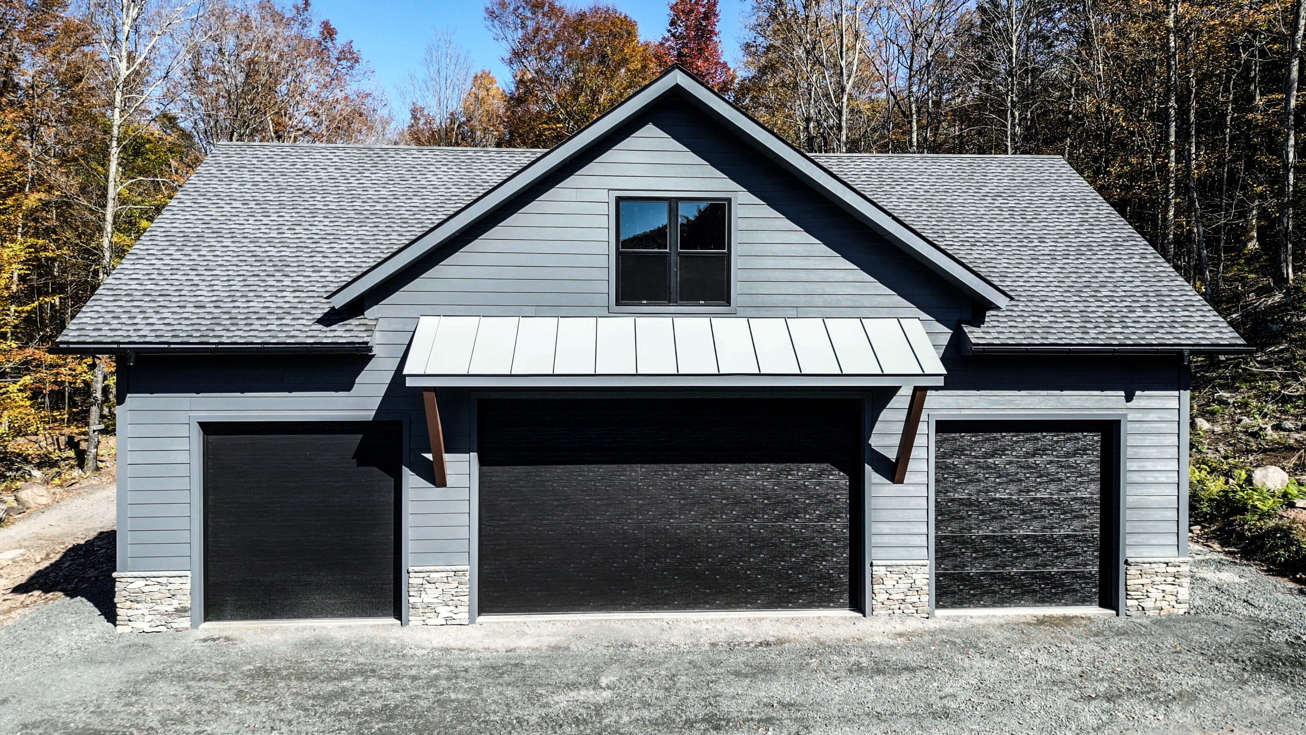 Hudson Valley Garage Front View New Garage Construction with Hardie siding and a standing seam metal roof.