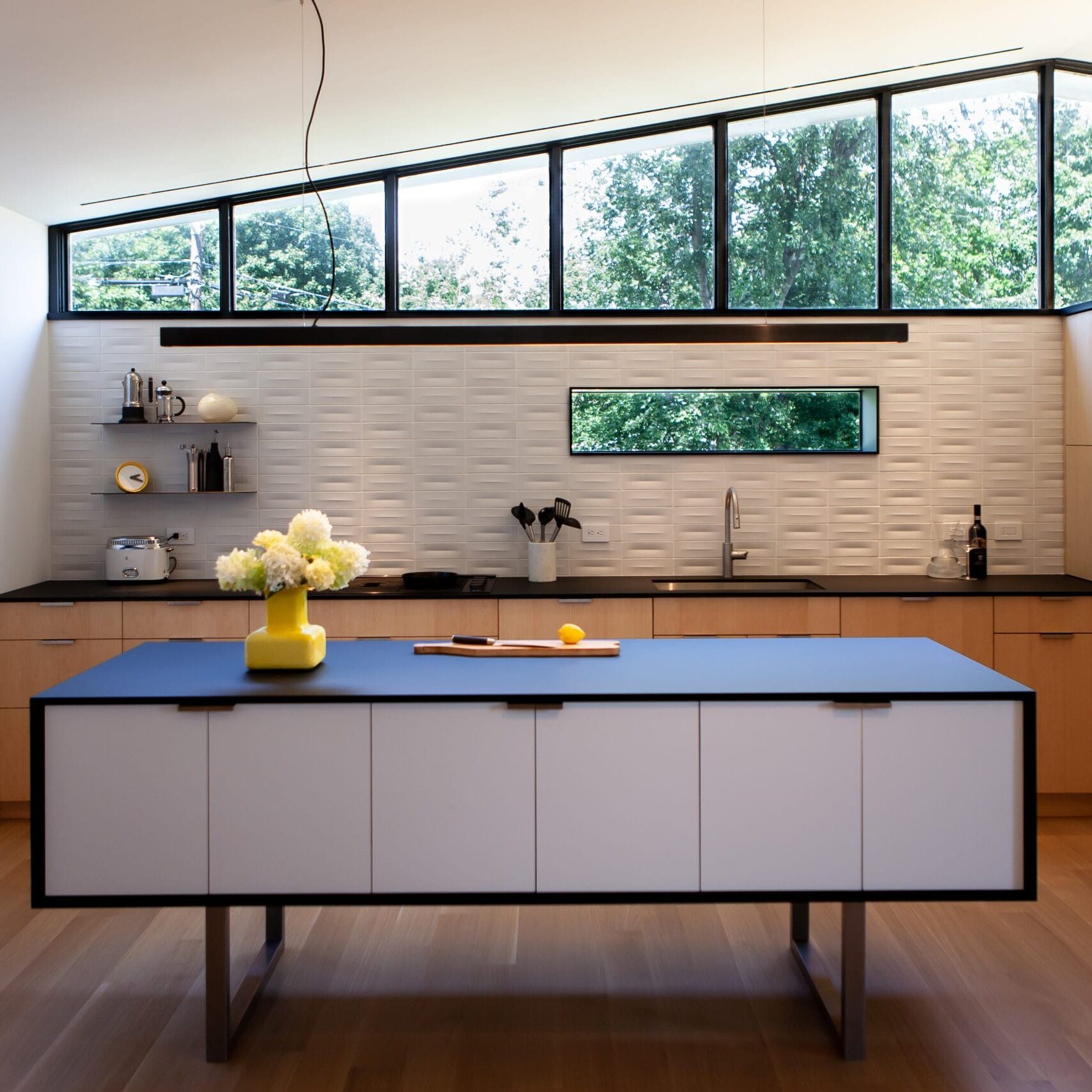 Modern Kitchen Remodeling with Central Island Modern kitchen with large windows and central island