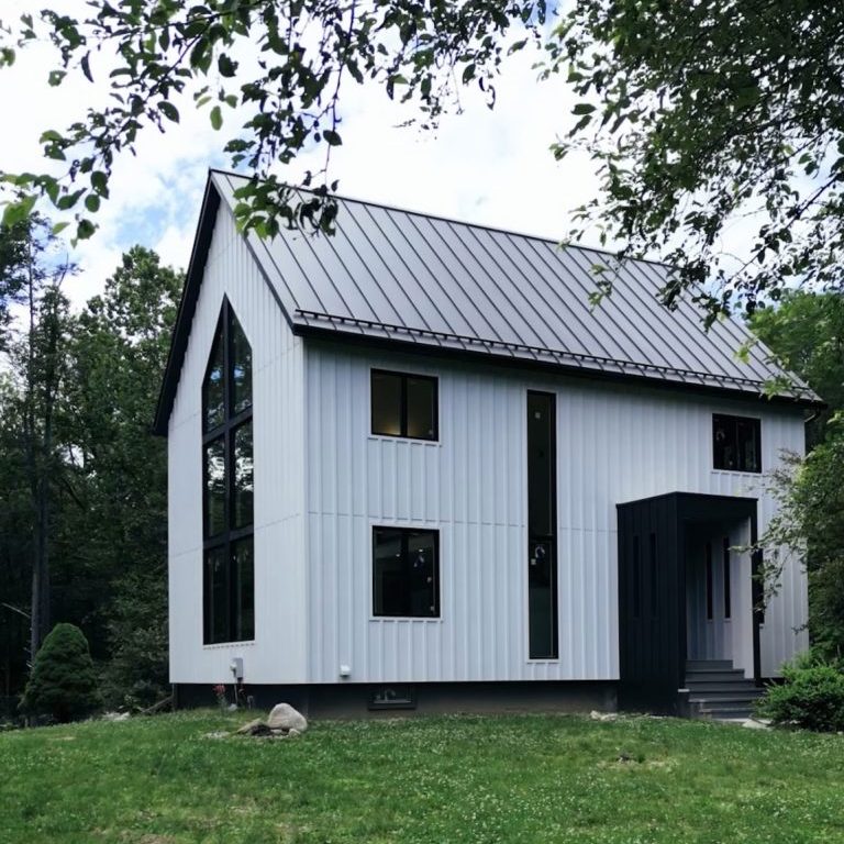 Custom-built luxury home in Hudson Valley with modern architecture and scenic landscape