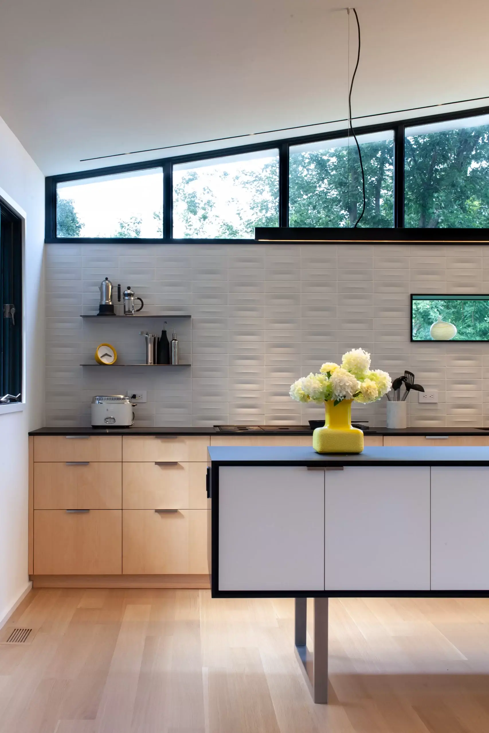 kitchen cabinets, some with a natural finish and some stained black